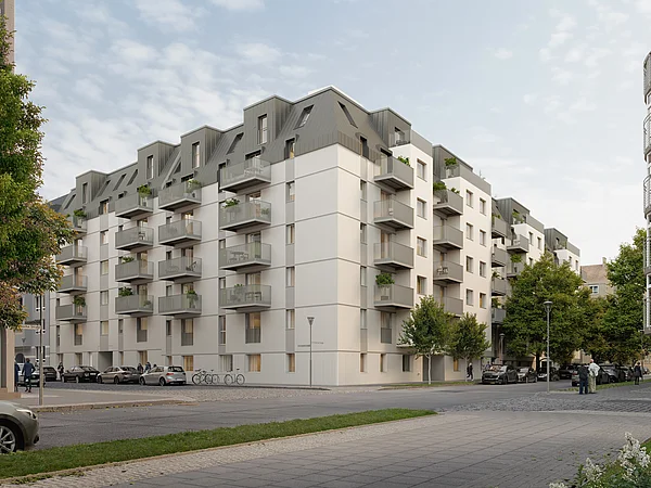 Modernes Wohngebäude mit Balkonen an Straßenecke
